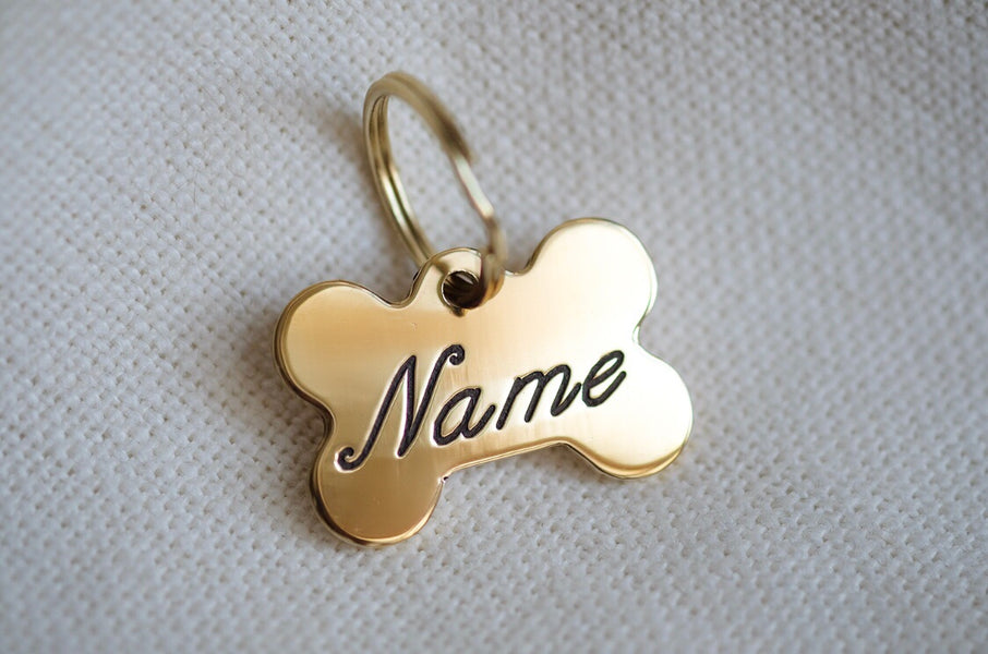 ㉖RIBERA Dog Tag チェーン付き 真鍮 Bone Shaped Brass Dog Tag - Cursive – Nugget Nielsen